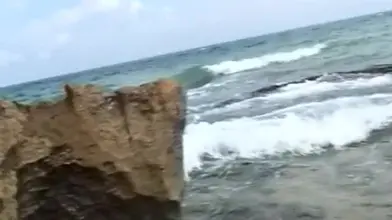 Plan cul sauvage sur une plage marocaine