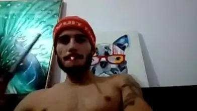 Un fumeur d'herbe montre sa bite