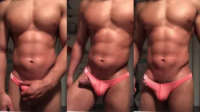 Abdos marocains découpés et string rose bulge tease en gros plan