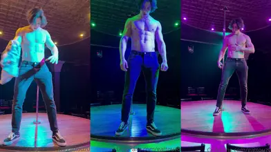 Strip-tease sur scène sous les lumières du club